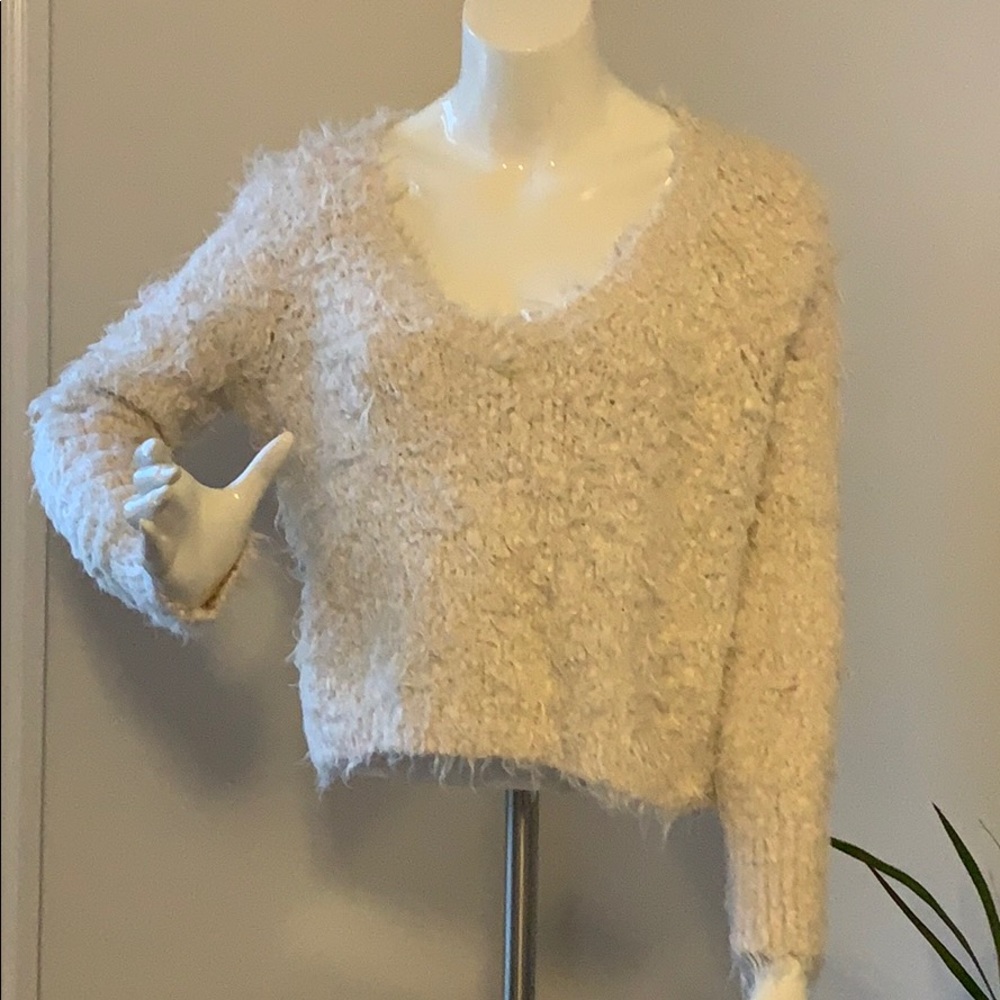 Knitted and knotted sweater